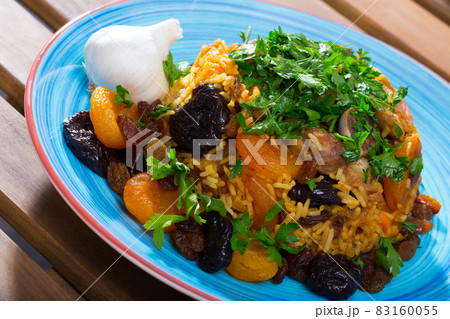 Pilaf from lamb, prunes, dried apricots Pilaf from lamb, prunes, dried apricots 83160055
