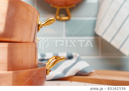 Modern kitchen details with copper kitchenware close up Modern kitchen details with copper kitchenware close up 83162556