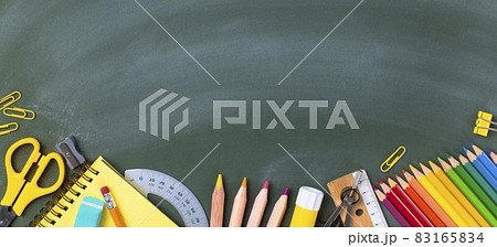 School supplies on blackboard. Back to school concept.. School supplies on blackboard. Back to school concept.. 83165834