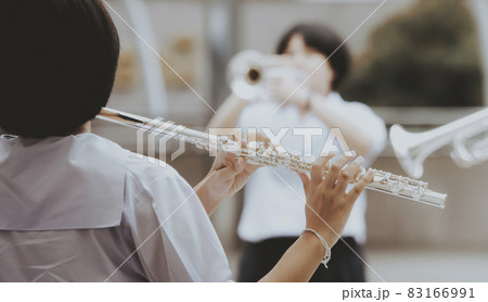 many children playing musical instruments 83166991