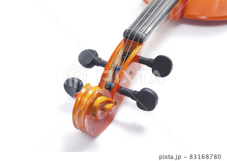 Part of old violin on white background. Musical instrument of vintage style. Part of old violin on white background. Musical instrument of vintage style. 83168780