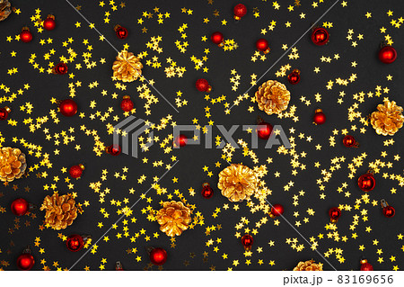 Christmas pattern of holiday decorations on dark background 83169656