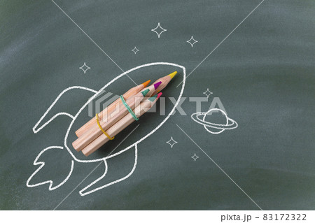 Drawing of a rocket with pencils on blackboard Drawing of a rocket with pencils on blackboard 83172322
