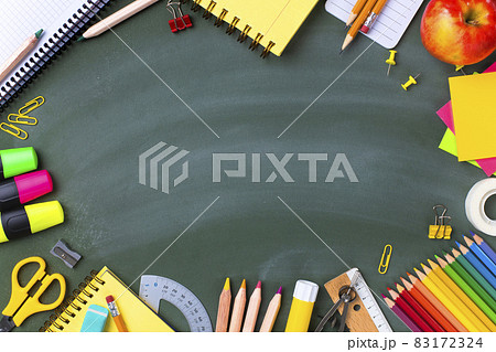 School supplies on blackboard. Back to school concept.. School supplies on blackboard. Back to school concept.. 83172324