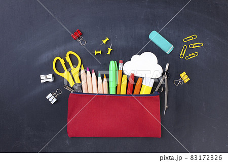 Back to school concept. Pencil case on blackboard Back to school concept. Pencil case on blackboard 83172326