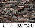 Decorative concrete tiles. Grey concrete wall. Grunge concrete wall. 83173241