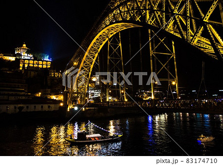 Portugal, night Porto, lights of night city, night panoramic view of The Eiffel Bridge, Ponte Dom Luis 83174710