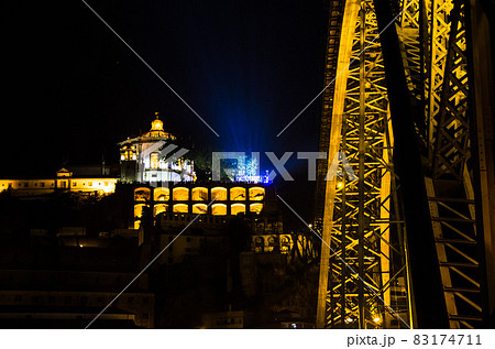 Portugal, night Porto, lights of night city, night panoramic view of The Eiffel Bridge, Ponte Dom Luis 83174711