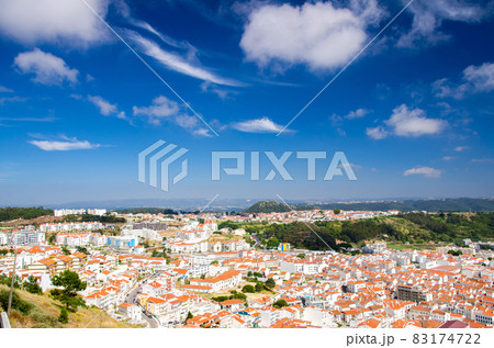 Portugal, panoramic view of the centre of Nazare city, red roof of Nazare 83174722