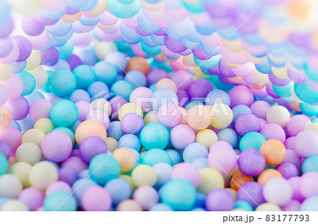 Foam beads of various colors brightly colored. 83177793