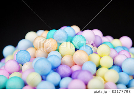 Foam beads of various colors brightly colored. 83177798