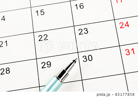 pen on a blank calendar for your text or message. pen on a blank calendar for your text or message. 83177858