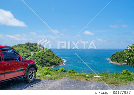 23 September 2021 Red 4x4 car Suzuki Vitara 1993 on the mountain in Phuket Thailand with Summer sea and small island background of free space for summer text and travel transportation background 83177927
