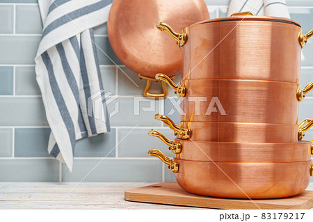 Modern kitchen details with copper kitchenware close up Modern kitchen details with copper kitchenware close up 83179217