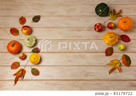 Fall background with yellow, red and green pumpkins 83179722