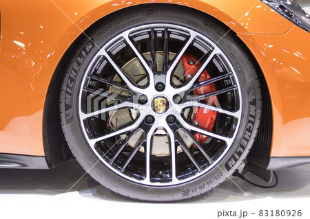 BANGKOK - Dec 2, 2020  Car show Porsche panamera 4s  at auto shows and other exhibitions selective focus car front wheels at Bangkok, Thailand 83180926