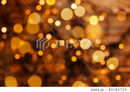 New Year, holiday blurred background. Gold bokeh light night luxury New Year, holiday blurred background. Gold bokeh light night luxury 83183724