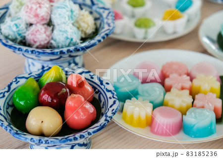 Close up of a set of Thai sweet dessert (Khanom Wan Thai) on the table. Thai desserts are a sweet and sometimes filling snack opposed to a light and airy Western style dessert. 83185236