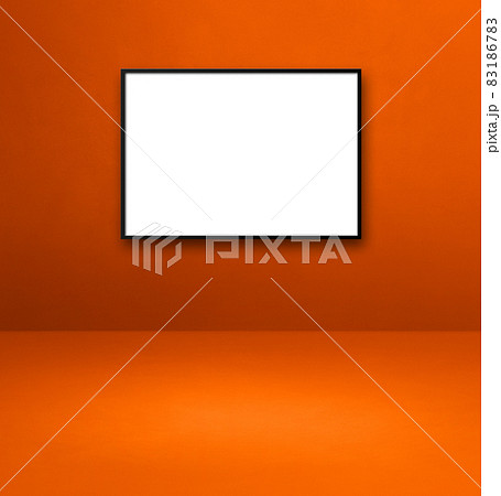 Black picture frame hanging on an orange wall 83186783