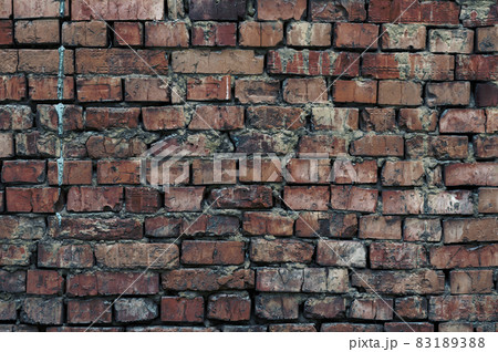 Grunge wall surface, texture of old red brick masonry, vintage background, blank retro template for ad banner design. Grunge wall surface, texture of old red brick masonry, vintage background, blank retro template for ad banner design. 83189388