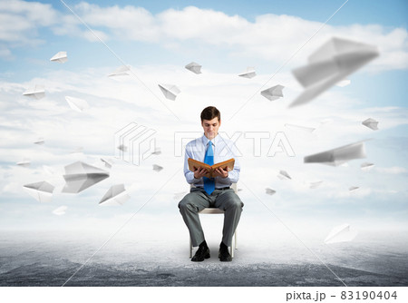 young businessman with book young businessman with book 83190404
