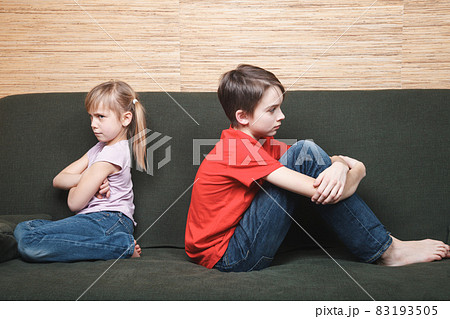 Frustrated siblings confined at home during self-isolation 83193505
