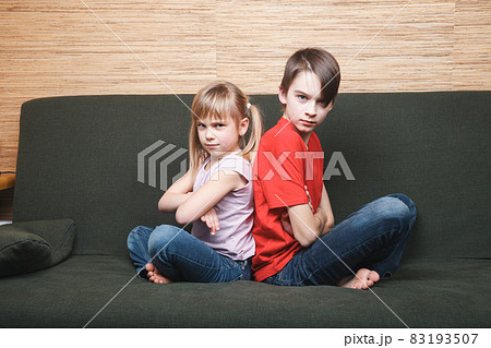 Frustrated siblings confined at home during self-isolation 83193507