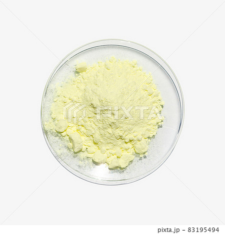 Close up chemical ingredient on white laboratory table. Sulfur Powder in Chemical Watch Glass. Top View 83195494