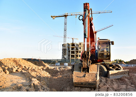 Bucket wheel excavator on earthmoving at construction site. Backhoe earthworks.  83200856
