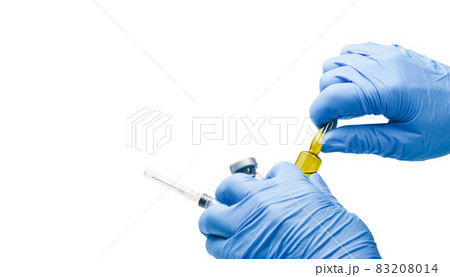 The medication ampules were breaker by the doctor with copy space on white background 83208014