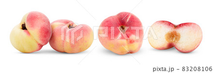 Ripe chinese flat peach fruit isolated on white Ripe chinese flat peach fruit isolated on white 83208106