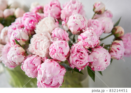 Lovely flowers in glass vase. Beautiful bouquet of pink peonies . Floral composition, scene, daylight. Wallpaper Lovely flowers in glass vase. Beautiful bouquet of pink peonies . Floral composition, scene, daylight. Wallpaper 83214451