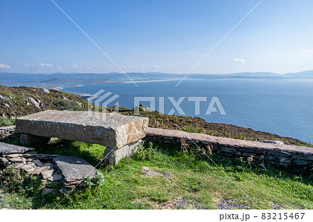 Stone bench at the viewpoint between Marmeelan and Crohy Head, Dungloe - County Donegal - Ireland. Stone bench at the viewpoint between Marmeelan and Crohy Head, Dungloe - County Donegal - Ireland. 83215467