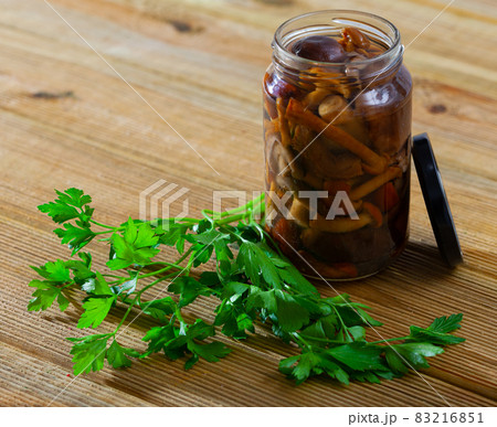 Tasty canned assorted mushrooms at glass jar, nobody Tasty canned assorted mushrooms at glass jar, nobody 83216851