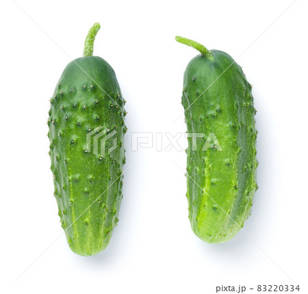 Two Fresh Green Cucumbers Isolated On White 83220334