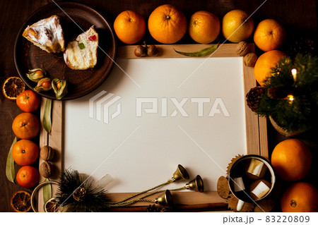 Christmas mockup. In the center is a white table in a wooden framed, around the Christmas decor. 83220809