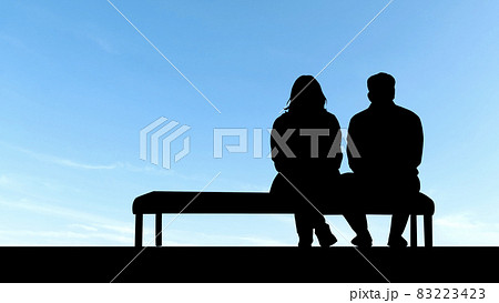 woman sitting on bench silhouette