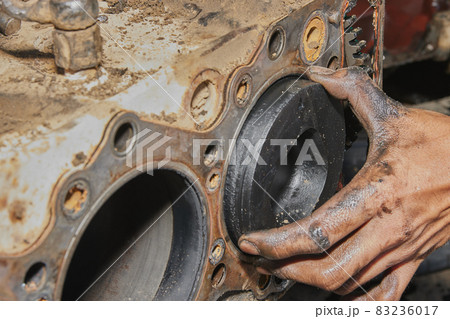 Car Mechanic Remove Cylinder Out Of Cylinder Block Car Mechanic Remove Cylinder Out Of Cylinder Block 83236017