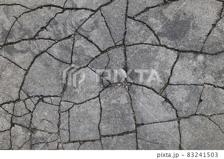 cracks on asphalt texture background 83241503