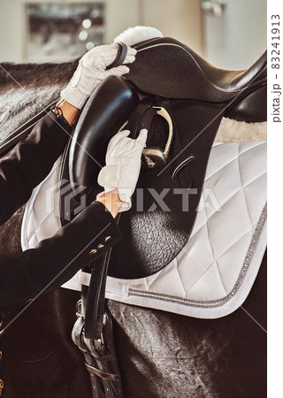 woman jockey with his horse woman jockey with his horse 83241913