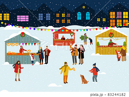 People at the winter fair in the evening. Christmas Fair, holiday. 83244182