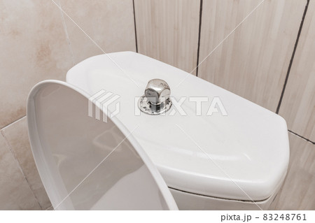 Toilet barrel water flush tank in the toilet drain or bathroom Toilet barrel water flush tank in the toilet drain or bathroom 83248761