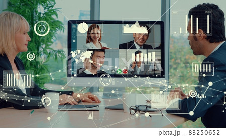 Creative visual of business people in a corporate staff meeting on video call 83250652