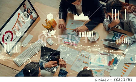 Creative visual of business people in a corporate staff meeting on video call 83251765