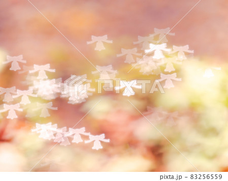 背景素材 リボンとベルのシルエット模様のリフレクション パステル系 背景素材 リボンとベルのシルエット模様のリフレクション パステル系 83256559