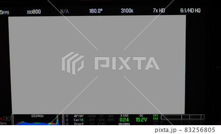 Video recording screen. Professional camera viewfinder frame on monitor screen. Screen showing status of red green blue color graph FPS and ISO number and setting data for videographer. film industry. 83256805