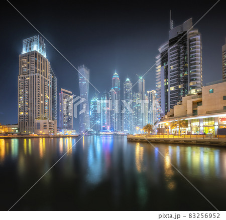 Night time panoramic view of Dubai Marina bay and city center, UAE 83256952