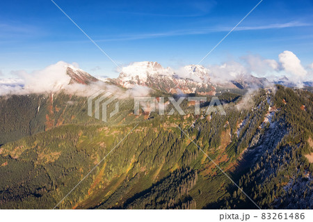 Aerial View of Canadian Rocky Mountains with snow on top during Fall Season. Aerial View of Canadian Rocky Mountains with snow on top during Fall Season. 83261486