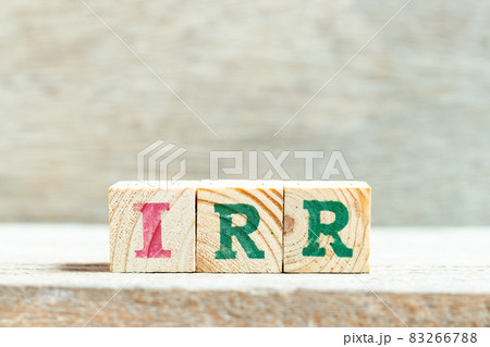 Alphabet letter block in word IRR (Abbreviation of internal rate of return) on wood background Alphabet letter block in word IRR (Abbreviation of internal rate of return) on wood background 83266788
