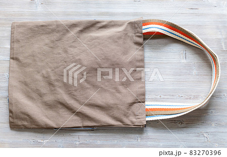 brown fabric double handles sling Bag on gray brown fabric double handles sling Bag on gray 83270396